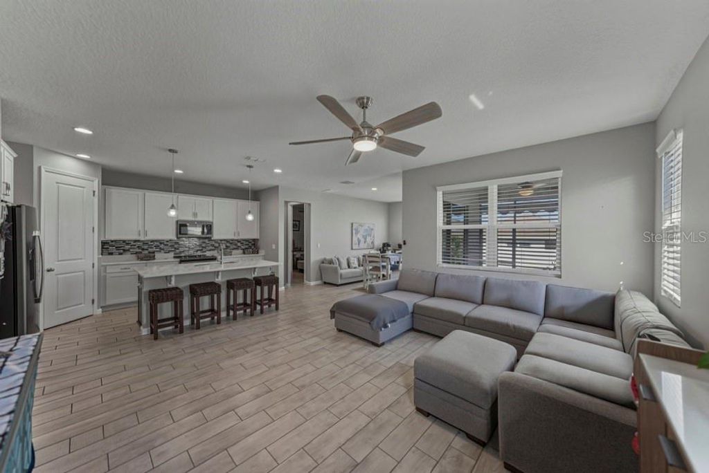 Photo of 295 Lake Smart Circle, Winter Haven, FL 33881 (MLS # TB8442058)