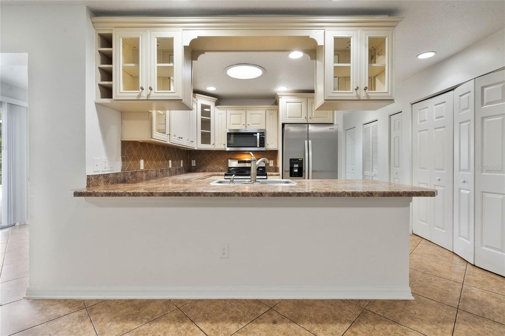 Photo of 907 Willow Drive, Leesburg, FL 34748 (MLS # W7883819)