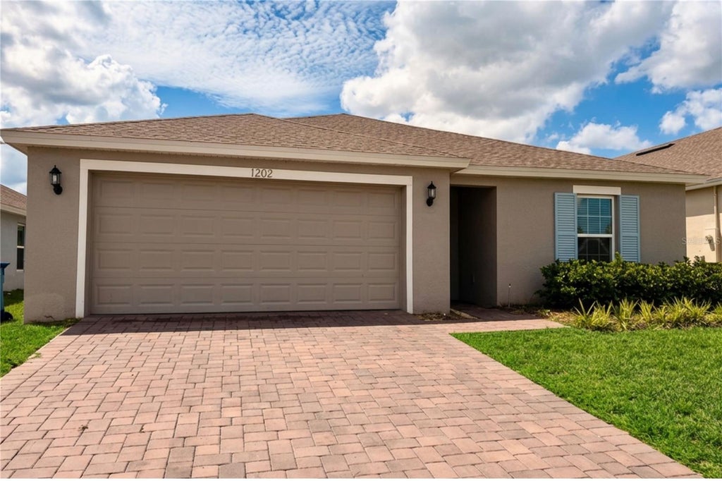 Photo of 1202 Tupelo Trail, Haines City, FL 33844 (MLS # S5156489)