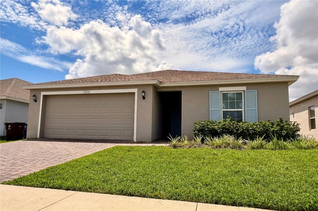 Photo of 1202 Tupelo Trail, Haines City, FL 33844 (MLS # S5156489)