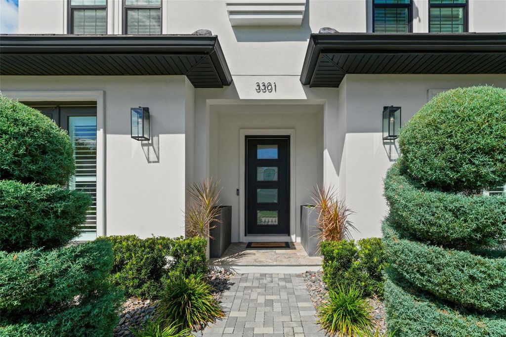 Photo of 3301 W Lawn Avenue, Tampa, FL 33611 (MLS # TB8438770)