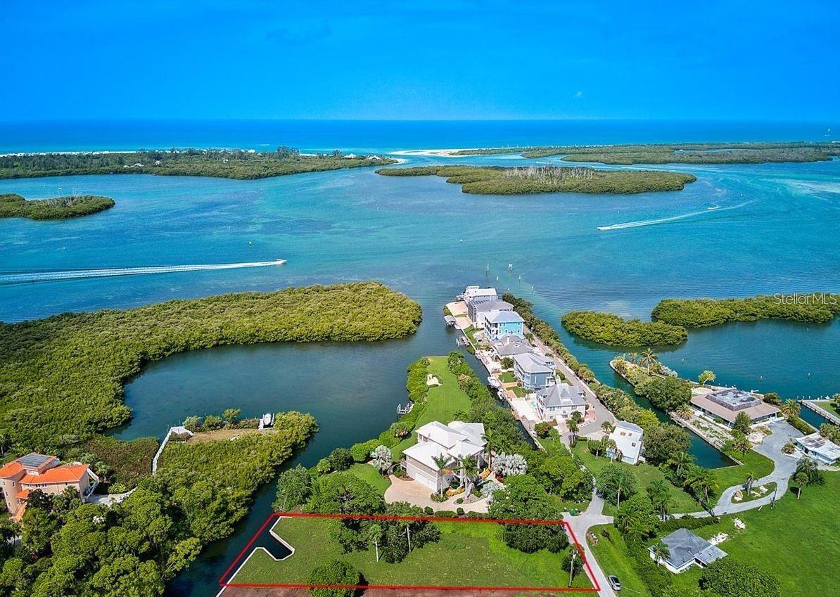 Seller will entertain any offer. Time to snag your waterfront dream property just opposite Stump Pass and the Gulf of Mexico in the fishing, boating paradise of sunny SW Florida. This extraordinary nearly half-acre, newly cleared lot is ideally located just two lots away from the Intercoastal Waterway. This area is renowned for its world-class Tarpon fishing, recreational boating, sunny beaches and golf courses galore. The jewels of this property are its 2022 concrete seawall lining the water's edge, complete with a private 2023 boat-slip, 16,000 pound boat lift and 2023 canopy. It's a boater's dream come true, to jump in the boat every day and explore the waterways. Build your dream house, and you'll find yourself effortlessly balancing days of adventure on the water with evenings of culinary delights and relaxation. This prime location is just minutes from the Gulf of Mexico's exquisite beaches and the renowned town of Boca Grande for restaurants or designer shopping. Whether you want to soak up the sun, swim in the crystal-clear waters, or take a leisurely stroll along the coastline, your enjoyment here will be endless. Make this slice of paradise yours and start living the Florida dream today!