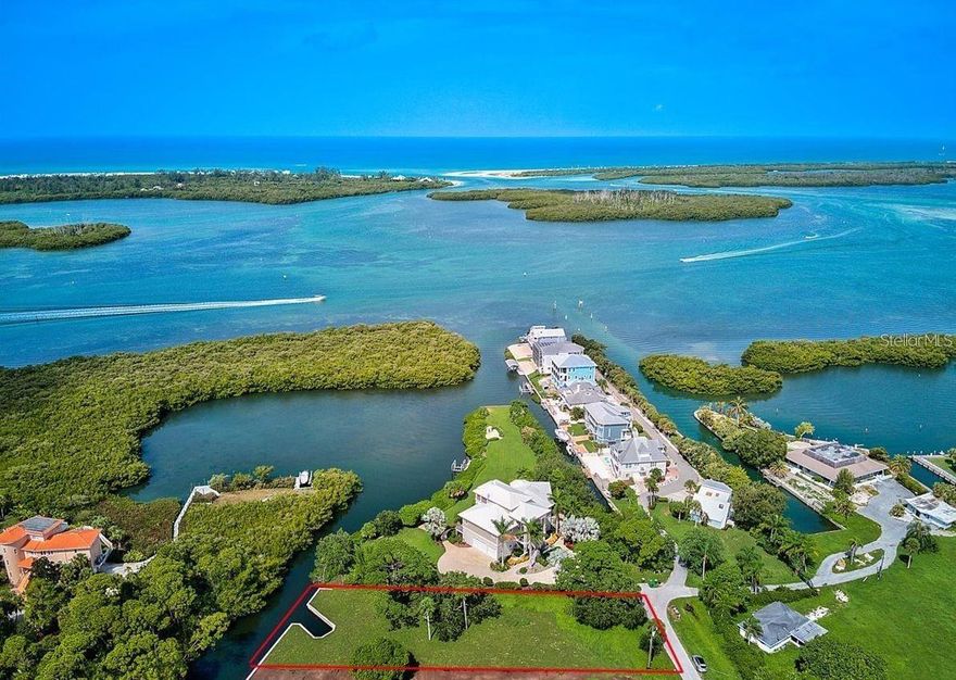 Seller will entertain any offer. Time to snag your waterfront dream property just opposite Stump Pass and the Gulf of Mexico in the fishing, boating paradise of sunny SW Florida. This extraordinary nearly half-acre, newly cleared lot is ideally located just two lots away from the Intercoastal Waterway. This area is renowned for its world-class Tarpon fishing, recreational boating, sunny beaches and golf courses galore. The jewels of this property are its 2022 concrete seawall lining the water's edge, complete with a private 2023 boat-slip, 16,000 pound boat lift and 2023 canopy. It's a boater's dream come true, to jump in the boat every day and explore the waterways. Build your dream house, and you'll find yourself effortlessly balancing days of adventure on the water with evenings of culinary delights and relaxation. This prime location is just minutes from the Gulf of Mexico's exquisite beaches and the renowned town of Boca Grande for restaurants or designer shopping. Whether you want to soak up the sun, swim in the crystal-clear waters, or take a leisurely stroll along the coastline, your enjoyment here will be endless. Make this slice of paradise yours and start living the Florida dream today!