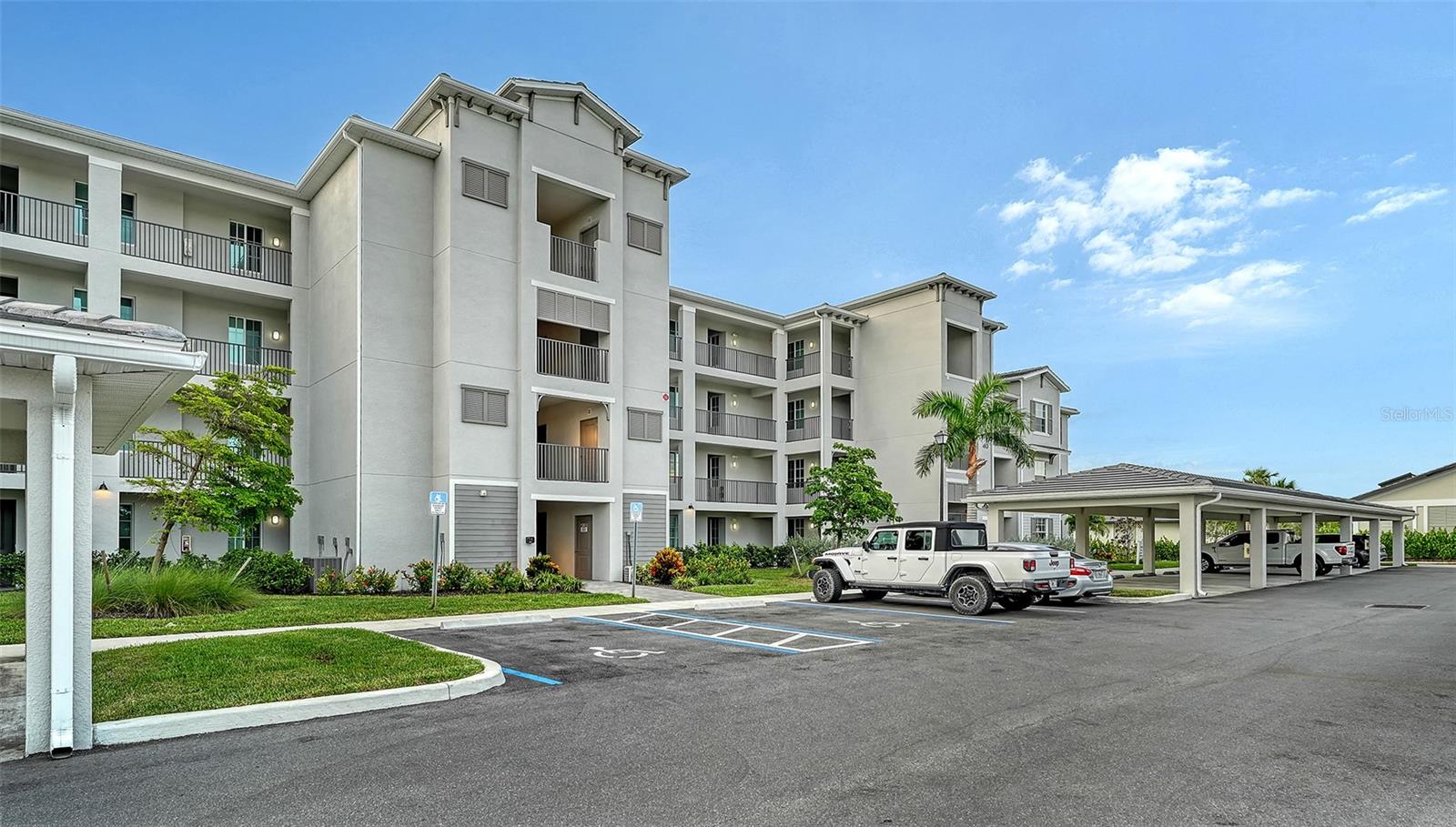 Welcome to Wellen Park Golf & Country Club! This light and bright three bedroom, two bath, end unit is well appointed with all of the comforts of home and is conveniently located in the building closest to all the amenities. Enjoy entertaining and meals on your private screened in lanai which showcases a stunning view of the lake and the fairway. Other resort-style amenities include; TIKI BAR, FITNESS CENTER, RESORT STYLE SWIMMING POOL WITH POOLSIDE SERVICE, 3 SATELLITE POOLS, TENNIS AND PICKLE BALL, BOCCE BALL, GYM AND MORE)! Golf Membership available for purchase. The Wellen Park community offers a brand-new downtown area with an expansive lake, walking trails, playground, retail shops, events, live music, local eateries, farmers market. Take in a Baseball game or many of the other events offered at the Cool Today Atalanta Braves Training Stadium just minutes away. Located within 20-minutes of 3 spectacular Gulf beaches. Escape the ordinary in this resort style community! Easy access to I-75, local shopping and dining and all Venice has to offer.