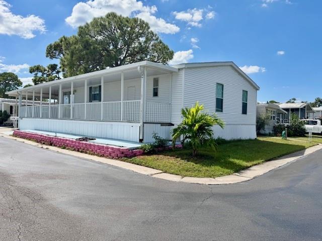 Welcome home to Melody Gardens, a vibrant and friendly 55+ Co-Op community located just 4 miles from St. Pete’s award-winning Gulf beaches! This 2005 double-wide manufactured home has been lovingly maintained and is ready for you to move right in. Even better — this is a NO LOT RENT community, and your ownership share is included in the sale, offering long-term security and affordability.
This spacious 2-bedroom, 2-bath home features an open floor plan, a spacious living area that flows into the dining room, and a bright, fully equipped kitchen ready for your favorite coastal recipes. There is an indoor washer and dryer for added convenience.  Oh, and not to mention the bonus room upon entry that can be an office/den. The home comes mostly furnished, so you can move right in and start enjoying the Florida sunshine.
Step outside to a wrap-around deck, perfect for morning coffee, outdoor dining, or evening gatherings. The 10x8 storage shed provides plenty of space for tools, bikes, or beach gear.
This home is located in a NON-FLOOD ZONE for added peace of mind, and within a golf-cart-friendly community known for its active and welcoming atmosphere. Residents enjoy access to a sparkling heated pool and hot tub, shuffleboard courts, pool hall, and clubhouse with live music, dances, and organized activities year-round.
Your ultra-low $180 monthly fee covers water, sewer, trash, common area maintenance, and access to all community amenities, making it one of the best values in Pinellas County.
Whether you’re looking for a winter escape, retirement home, or low-maintenance year-round residence, this property offers unbeatable value, comfort, and location. One resident must be 55 or older. 
Just minutes to St. Pete Beach, Treasure Island, shopping, dining, and medical facilities keeping you close to all the fun and relaxation Florida has to offer. Ready to begin your New Adventure?  Book your private Tour TODAY!