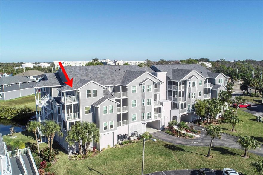 Wake up to stunning water and pool views from this beautifully maintained third-floor corner residence in Mariners Way, now available for rent. This light-filled home features cathedral ceilings, expansive windows, and two private balconies—one off the living area and one from the primary bedroom—perfect for enjoying Florida sunrises and sunsets. The open-concept layout connects the kitchen and living space, ideal for relaxed coastal living. Recent upgrades include hurricane-impact windows and sliding doors. Additional conveniences include covered parking, private exterior storage, elevator access, and kayak and bike storage. Ideally located just minutes from downtown New Port Richey, dining, shopping, and waterfront events. Enjoy the best of Florida’s waterfront lifestyle.