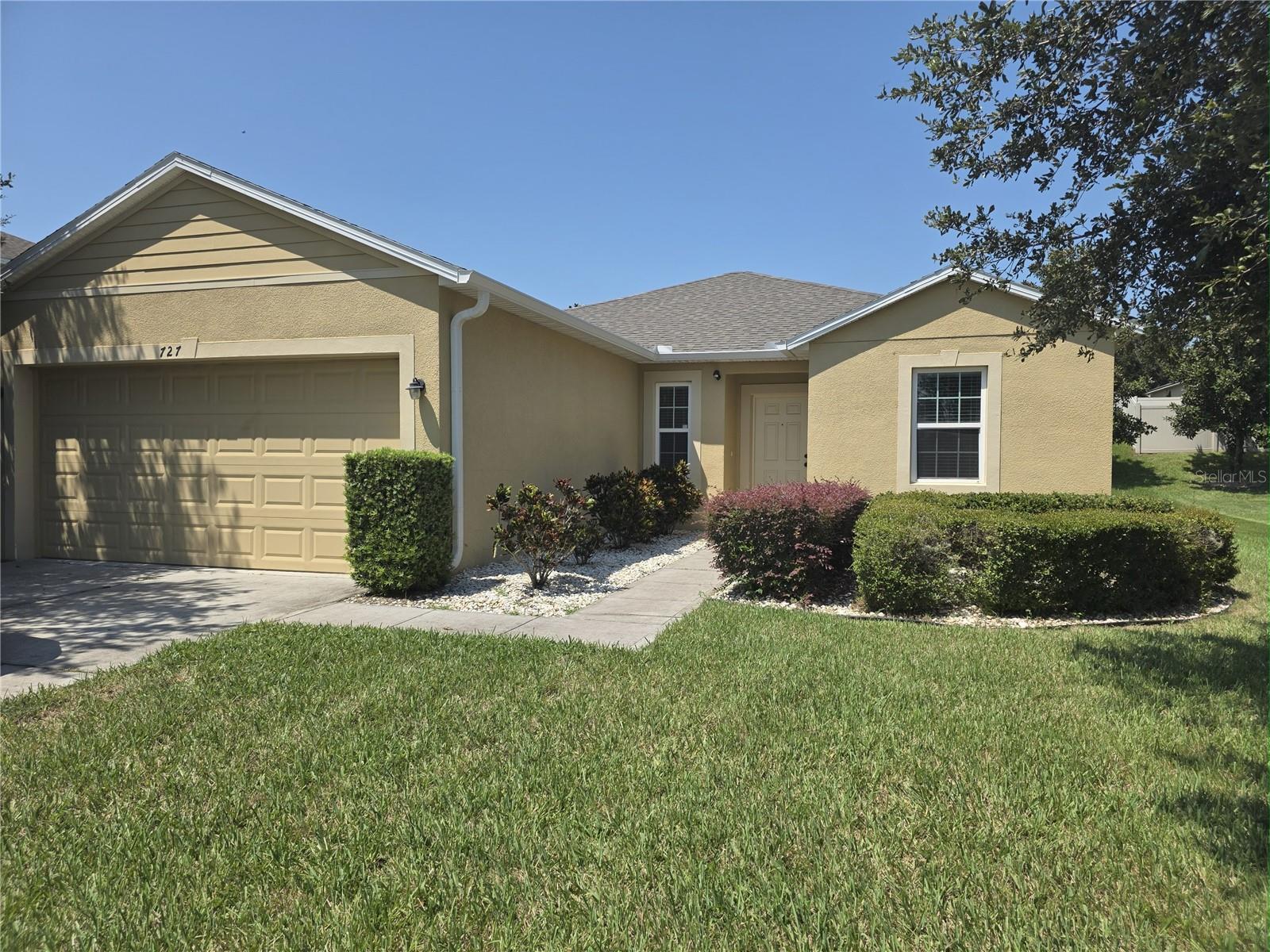 Nicely kept 3 bedrooms 2 bath 2 car garage, located between Clermont and Groveland off hwy 50 W. Close distance to shopping, restaurants, schools, etc. Ceramic tiles throughout the entire house. This house has been freshly painted. Kitchen with all Stainless Steel appliances and glass backsplash. Inside laundry and covered back porch for your summer BBQ. Available 7/1/2025