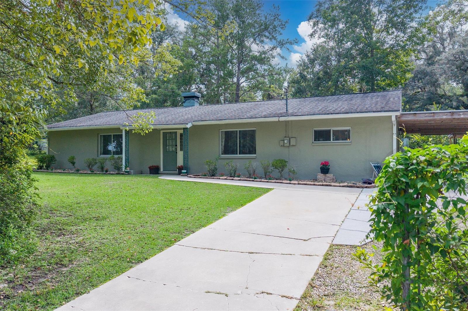 Welcome to this spacious 3-bedroom, 2-bath home with a bonus room and 1.860 sq ft of living space, offering comfort, charm, and flexibility. Inside, you'll find a country-style kitchen, cozy fireplace, and water-resistant vinyl flooring throughout the main living areas. Step outside to your almost full acre, fully fenced yard, featuring a 16-ft above ground swimming pool to cool off on those hot Florida days. You will also find three storage sheds, and fruit trees, including persimmon, grapefruit, and Japanese plum. Whether you're entertaining or relaxing, this backyard is ready for it all. The home was freshly painted with-in the last 3 years and is just a short walk to downtown Brooksville, where you can enjoy local boutiques, restaurants, and monthly festivals. You're also just about a 10 minute to the Suncoast Parkway for easy commuting. With no HOA fees and the seller offering 3,000 toward closing, this house just became more affordable. Come see the charm and value this home has to present to you.