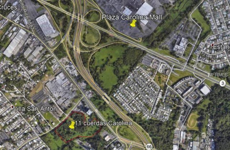 11 cuerdas in front of Century Business Park in Carolina. Approved for 300 residential units