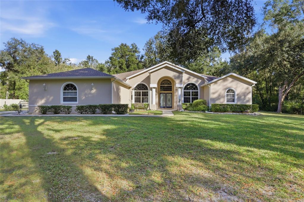 Photo of 4060 S Kenvera Loop, Inverness, FL 34450 (MLS # O6362556)
