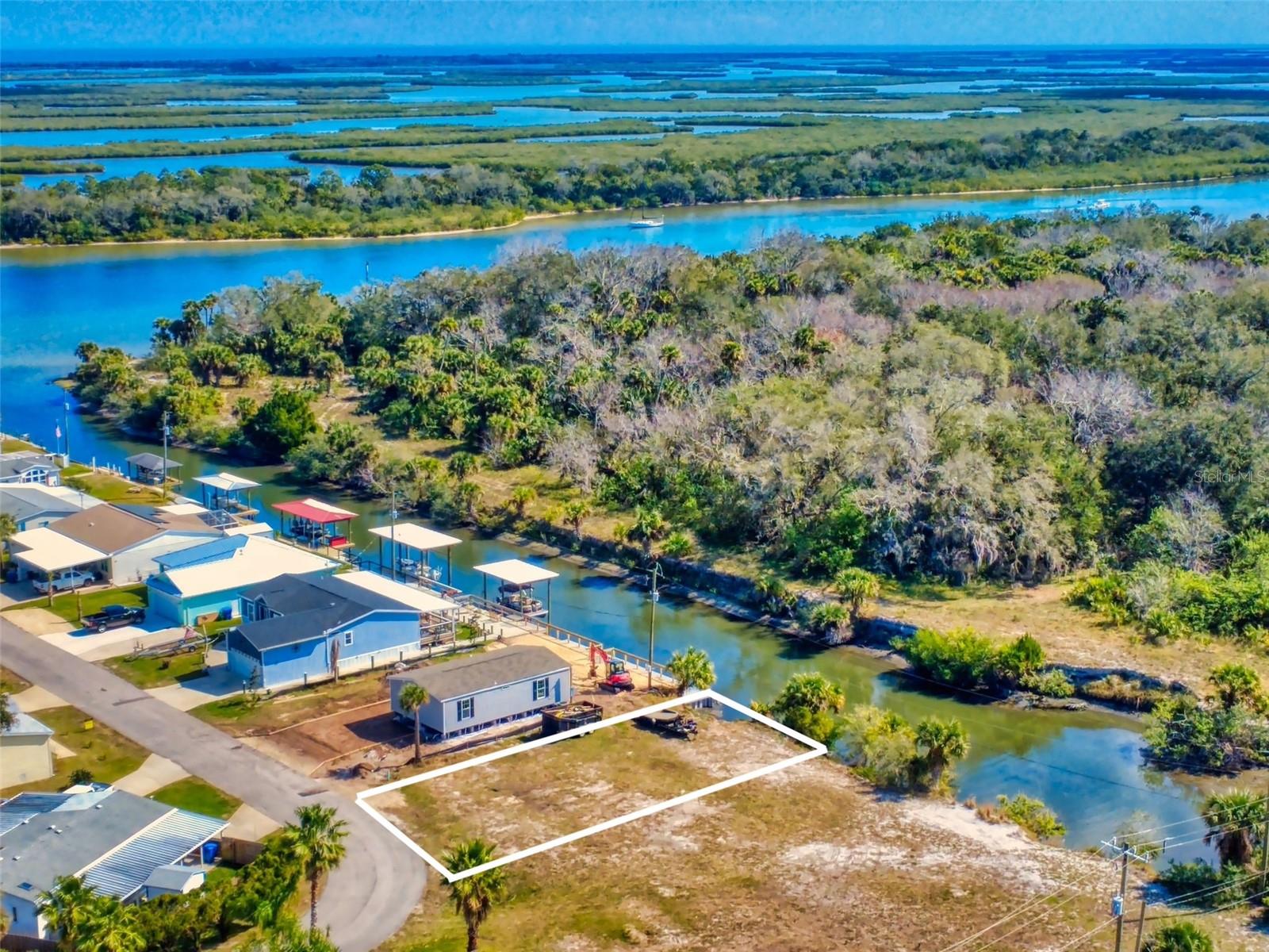 New price reduction. One of the few waterfront lots for sale in the area and seller is motivated ! This is a wonderful opportunity to have that dream home on the water - located just off the intracoastal waterway in Edgewater. Property is zoned residential allowing for mobile home or you can choose your own builder and build the perfect home for your family. Terra Mar Village is a direct intracoastal front community and has many amenities for its residents; community boat ramp, 2 saltwater pools , fishing dock directly on the intracoastal and even covered docks for lease with boat lifts until you get your dock built. Come take a look!