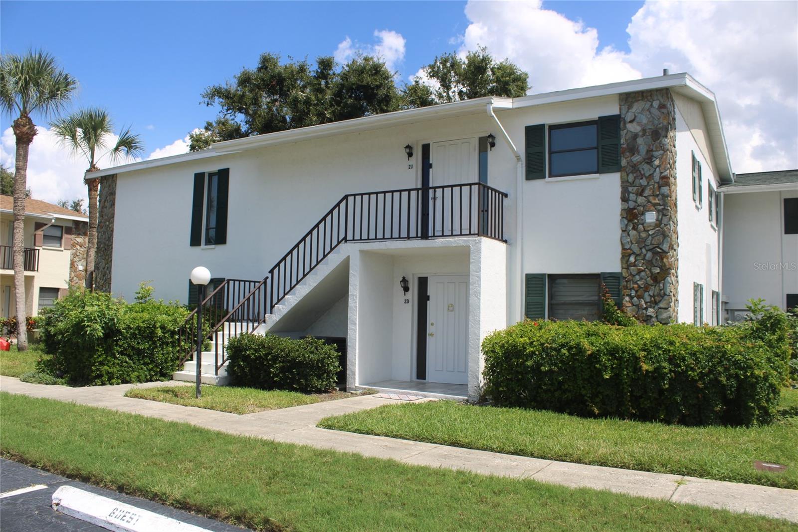 First floor corner unit in Morton Village Condos. Ceramic tile throughout and a wonderful granite counter top modern kitchen. Ready for immediate occupancy. Both the living room and main bedroom have the enclosed patio attached. New roof, new paint, new entrance tile, new hot water heater. A wide open floor plan along with inside laundry makes for comfortable living. The community has 2 in ground pools, a sauna and exercise room complimenting a clubhouse with kitchen. Super central Bradenton location. This unit includes a designated carport space.