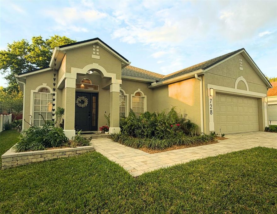 You'll know the moment you walk in. This feels like home. Situated within the highly desirable gated development of Woodbridge Lakes in Lake Mary, 728 Tigris Lane features 3 bedrooms, 2 baths, and a light-filled split floor plan. Built with solid concrete block construction, this home offers peace of mind along with thoughtful upgrades throughout. Engineered hardwood floors and heavy crown molding add a level of elegant warmth to the open layout. The eat-in kitchen, complete with bright solid wood cabinetry, stainless steel appliances, pantry closet and a large breakfast bar, creates a natural gathering space at the heart of the home. The spacious primary bedroom is a true retreat, featuring an en suite bathroom with double sinks, an inviting garden tub, and walk-in closet. Step outside to enjoy the screened patio, upgraded with no-rail super screen and beautiful pavers. Surrounded by lush landscaping, the space is ideal for relaxing or enjoying the outdoors year-round. Additional highlights include a paver driveway, double car garage with built-in storage cabinets, recently installed rain gutters, and pride of ownership throughout. Located with easy access to I-4, this home offers unmatched convenience, placing you just minutes from the best Lake Mary and the surrounding Orlando area has to offer. Enjoy close proximity to major healthcare centers, including Orlando Health and AdventHealth, as well as top-rated Seminole County schools, shopping, dining, and more. Inside the gates of this beautiful community are a lakefront park with updated playground & exercise equipment, a picnic gazebo, and a basketball court. This is more than a house, it's the home and lifestyle you've been waiting for. Call today to schedule a private tour.