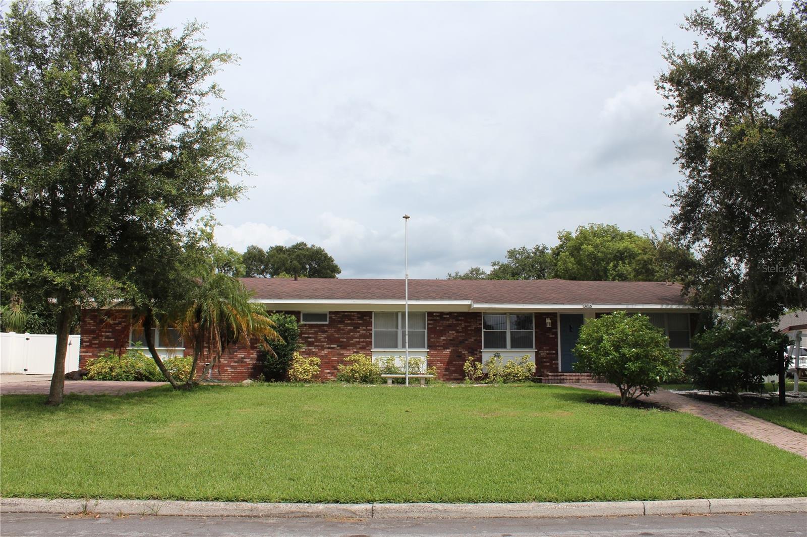 Welcome to your new Florida home! This property features 4 bedrooms, 2 bathrooms, 2 car attached garage, large screened in back porch, extra parking in front and back, fenced in back yard, formal living room, separate family room with fireplace, formal dining room and much more! Yard care included in the monthly rent. All applicants must pass a credit and criminal background check. NO EXCEPTIONS. Hurry and schedule your showing today, this property won't last long!