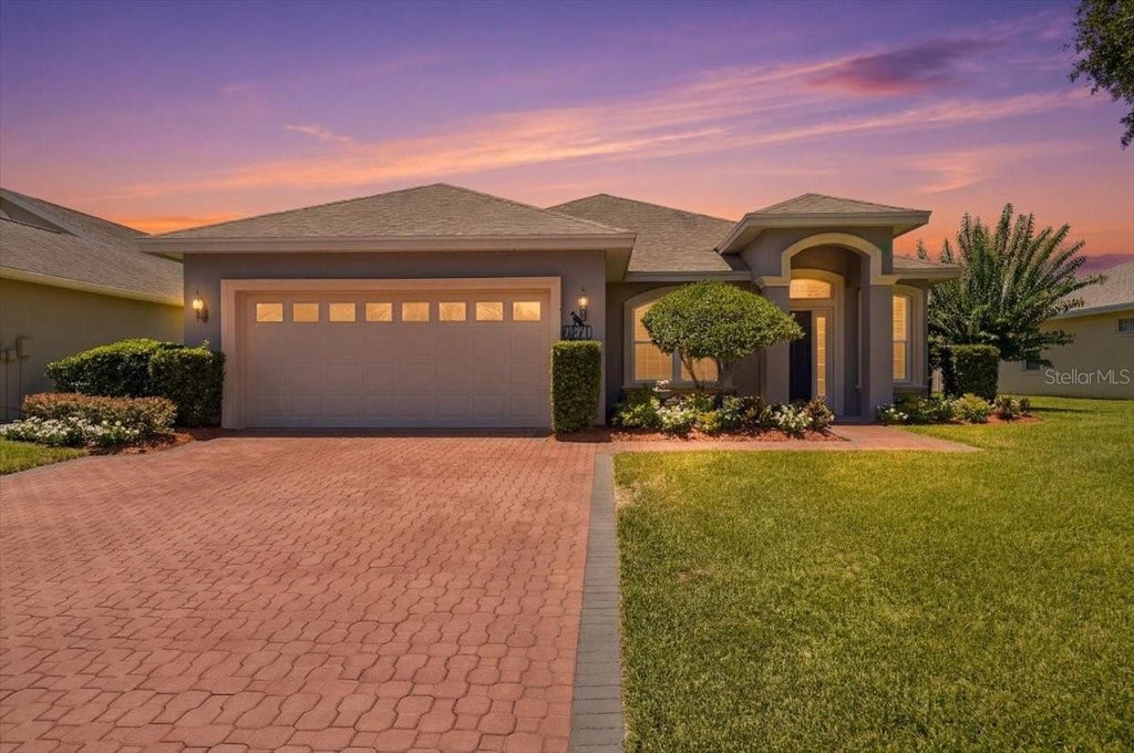 Photo of 3221 Oak Tree Lane, Winter Haven, FL 33884 (MLS # P4939356)