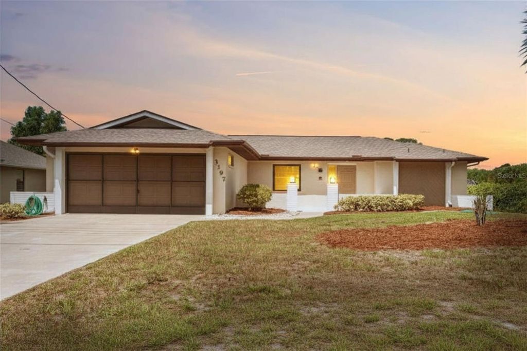 Photo of 3197 Rock Creek Drive, Port Charlotte, FL 33948 (MLS # C7525167)