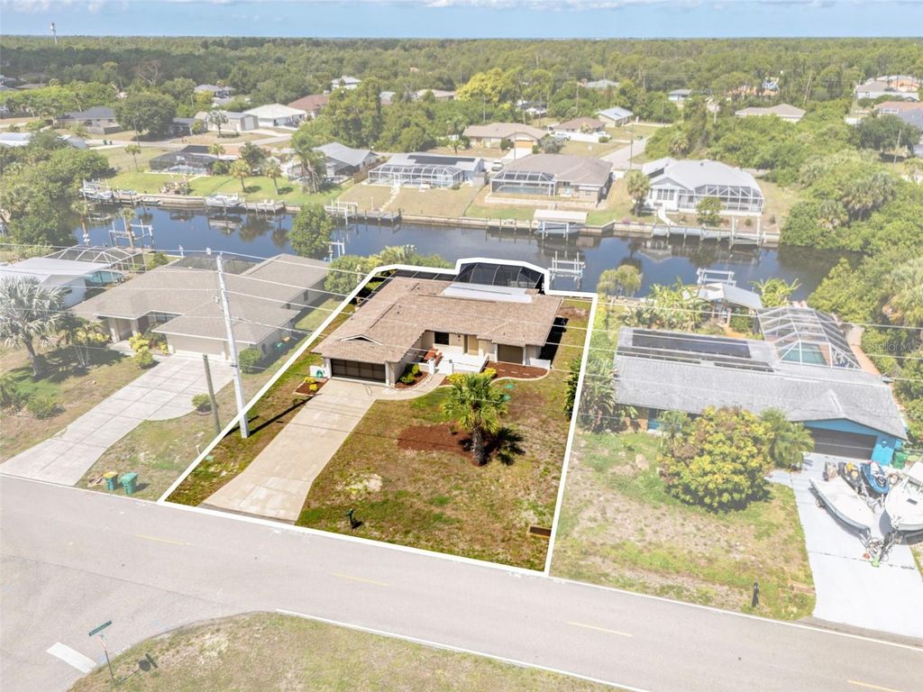 Photo of 3197 Rock Creek Drive, Port Charlotte, FL 33948 (MLS # C7525167)