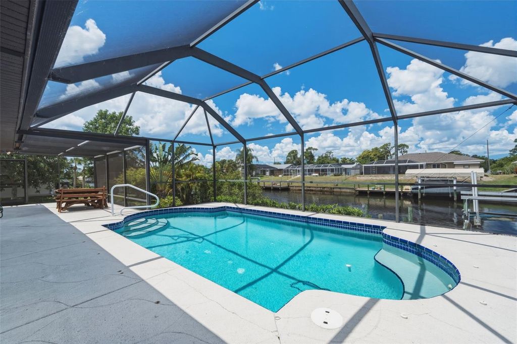 Photo of 3197 Rock Creek Drive, Port Charlotte, FL 33948 (MLS # C7525167)