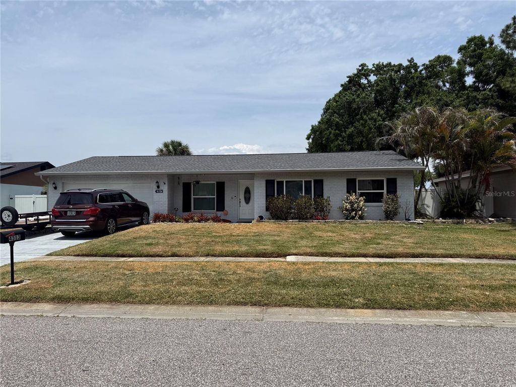 Photo of 4313 Hollow Hill Drive, Tampa, FL 33624 (MLS # TB8507375)