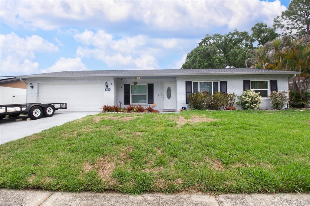 Photo of 4313 Hollow Hill Drive, Tampa, FL 33624 (MLS # TB8507375)