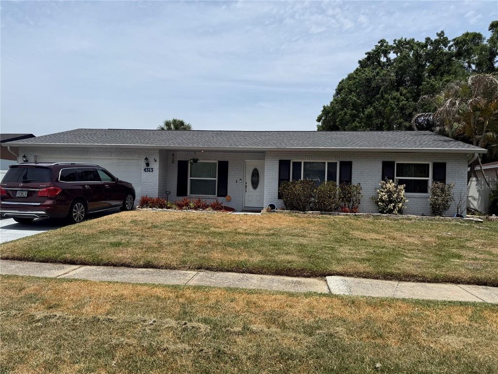 Photo of 4313 Hollow Hill Drive, Tampa, FL 33624 (MLS # TB8507375)