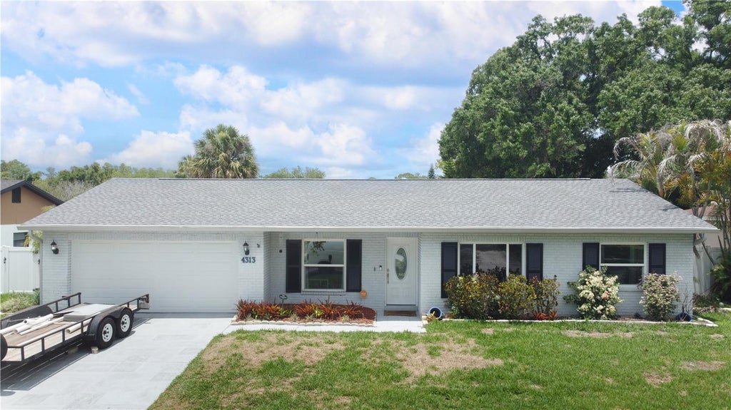 Photo of 4313 Hollow Hill Drive, Tampa, FL 33624 (MLS # TB8507375)