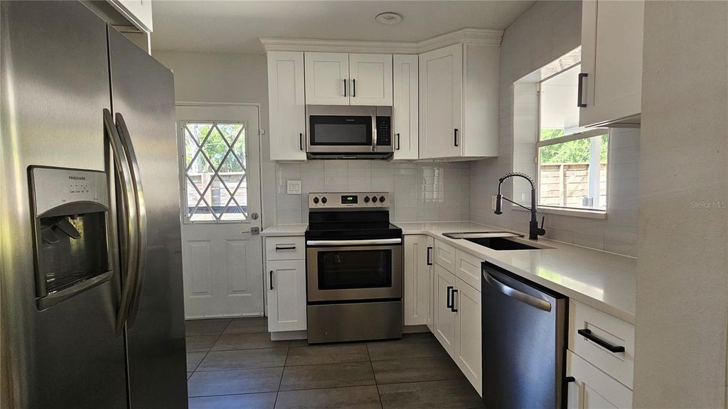 Photo of 125 E Miller Street, Orlando, FL 32806 (MLS # O6356377)