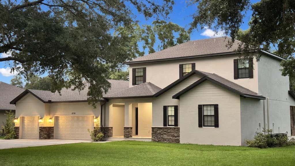 Photo of 2730 Robertson Trl, Lutz, FL 33559 (MLS # O6412324)