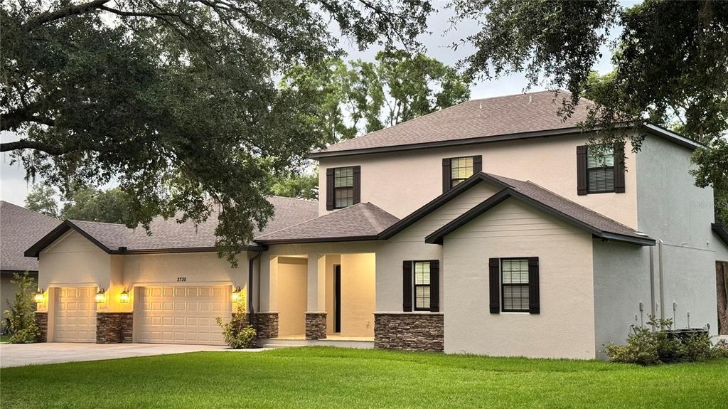 Photo of 2730 Robertson Trl, Lutz, FL 33559 (MLS # O6412324)