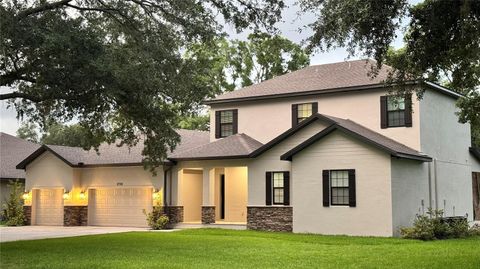 Photo of 2730 Robertson Trl, Lutz, FL 33559 (MLS # O6412324)