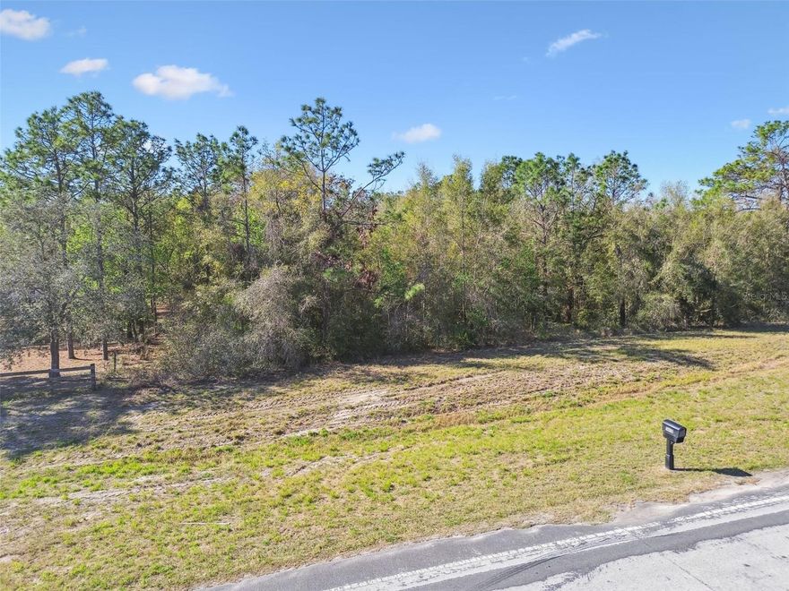 PRICE JUST MODIFIED by 18k less! Discover the potential of this 3-acre agricultural-zoned property for those looking for space and freedom. This vacant land offers incredible flexibility for a variety of uses—whether you are looking to build a home, start a small ranch, have some livestock,  bring your big toys, or create a garden oasis. Owner already paid for a site plan / typography and has on hand, saves you money, along with option of design/build plans if you choose to use them or not, is up to you.

Situated on a public asphalt road, the property address is surrounded by trees and other residential homes and larger ranch-style properties, providing a balance of seclusion with quick access to major roads to Tampa, Crystal River or jump on 50 towards The Villages and Orlando. This property could be ideal for someone looking to build a home / barn / quonset and bring their equipment to have access to major roads, for horse shows or shorter commute to service clients. 

Property Owner has a survey and custom home plans from a previous build concept are available at no additional cost and may be included with the sale if the buyer is interested - ready for permitting. Use of these plans is completely optional. Please contact agent to view these documents.

FEMA Zone X designation which can help keep homeowners insurance costs more affordable. 

Brooksville is known for its historic charm and natural beauty, offering a variety of recreational and lifestyle amenities: 
• Shopping & Dining: Just minutes from Cortez Boulevard and Downtown Brooksville, where you will find boutique shops, breweries, and local restaurants.
• Outdoor Activities: Brooksville is home to a local winery and numerous equestrian trails, making it a great place for horseback riding and enjoying the countryside. It is also close to the famous Weeki Wachee Natural Springs, perfect for kayaking and exploring Florida's natural beauty.
• Gulf Access & Boating: Only a 25-minute drive to public boat ramps leading to the Gulf of Mexico, making it ideal for fishing and boating enthusiasts, including waterfront dining. 
• Suncoast Bike Trail Access: The Suncoast Bike Trail is just a short walk across an overpass, connecting you to miles of scenic trails perfect for biking, walking, and running.
•  Withlacoochee State Forest is close by, one of the largest forests in Florida, is perfect for hiking, camping, horseback riding, and ATV trails.
• Convenient Commuting: Approximately 40 minutes to Tampa International Airport, with easy access via the Suncoast Parkway. Visit Disney, Universal & SeaWorld in 2 hours for a weekend getaway. Shoot up to Crystal River / Homosassa in less than 1/2 hour. 

Affordable Cost of Living & Spacious Properties compared to larger metro areas, Brooksville offers more land for your money while still providing modern conveniences. Whether you are looking for a large lot for a custom home, a farm, or a peaceful retreat, Brooksville delivers both value and lifestyle. If you are looking to live without the hustle and bustle with being close to conveniences and access to commuting this may be the right property for you.