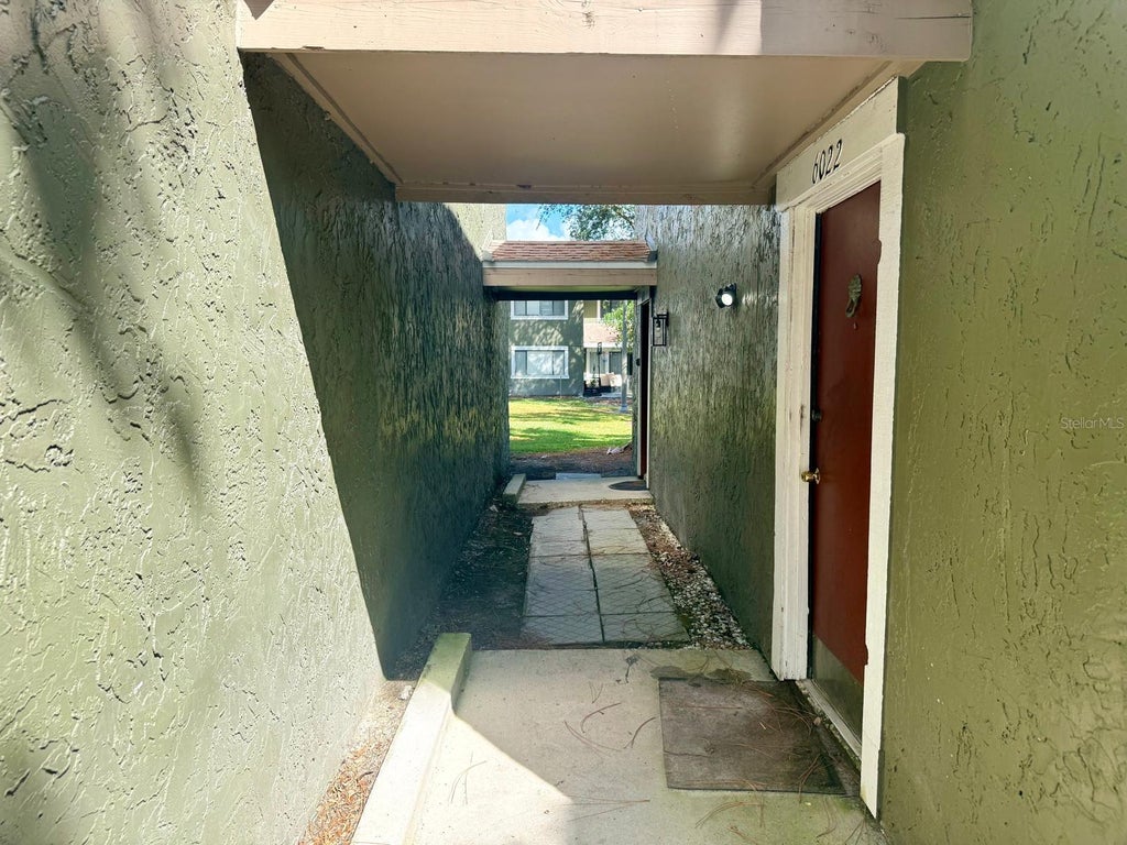 Photo of 6022 Peregrine Avenue #20B, Orlando, FL 32819 (MLS # O6451754)