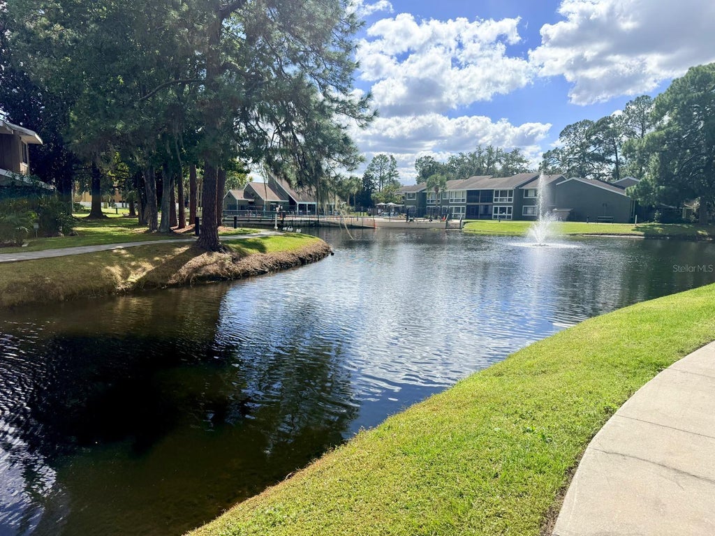 Photo of 6022 Peregrine Avenue #20B, Orlando, FL 32819 (MLS # O6451754)
