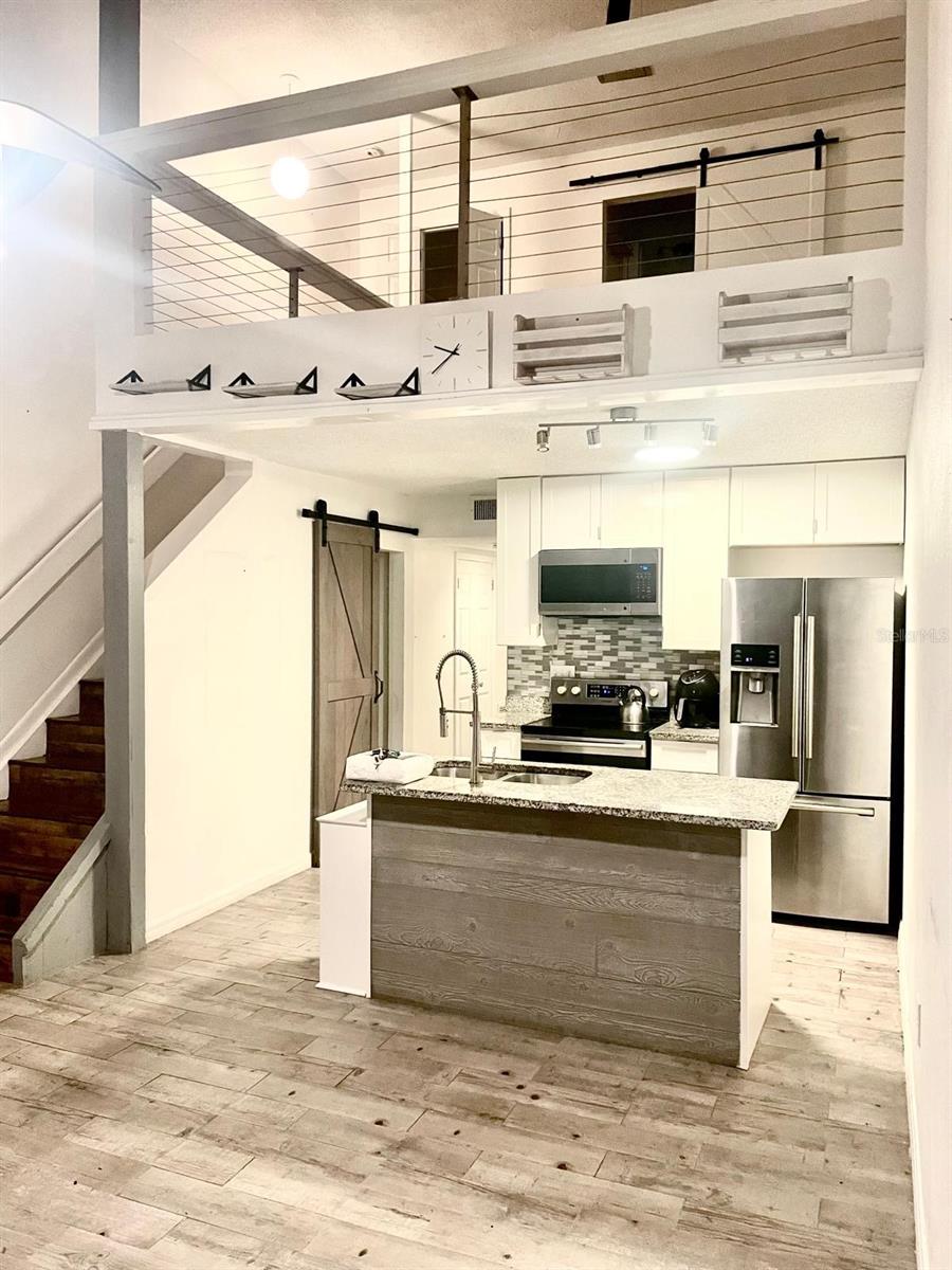 Photo of 6022 Peregrine Avenue #20B, Orlando, FL 32819 (MLS # O6451754)