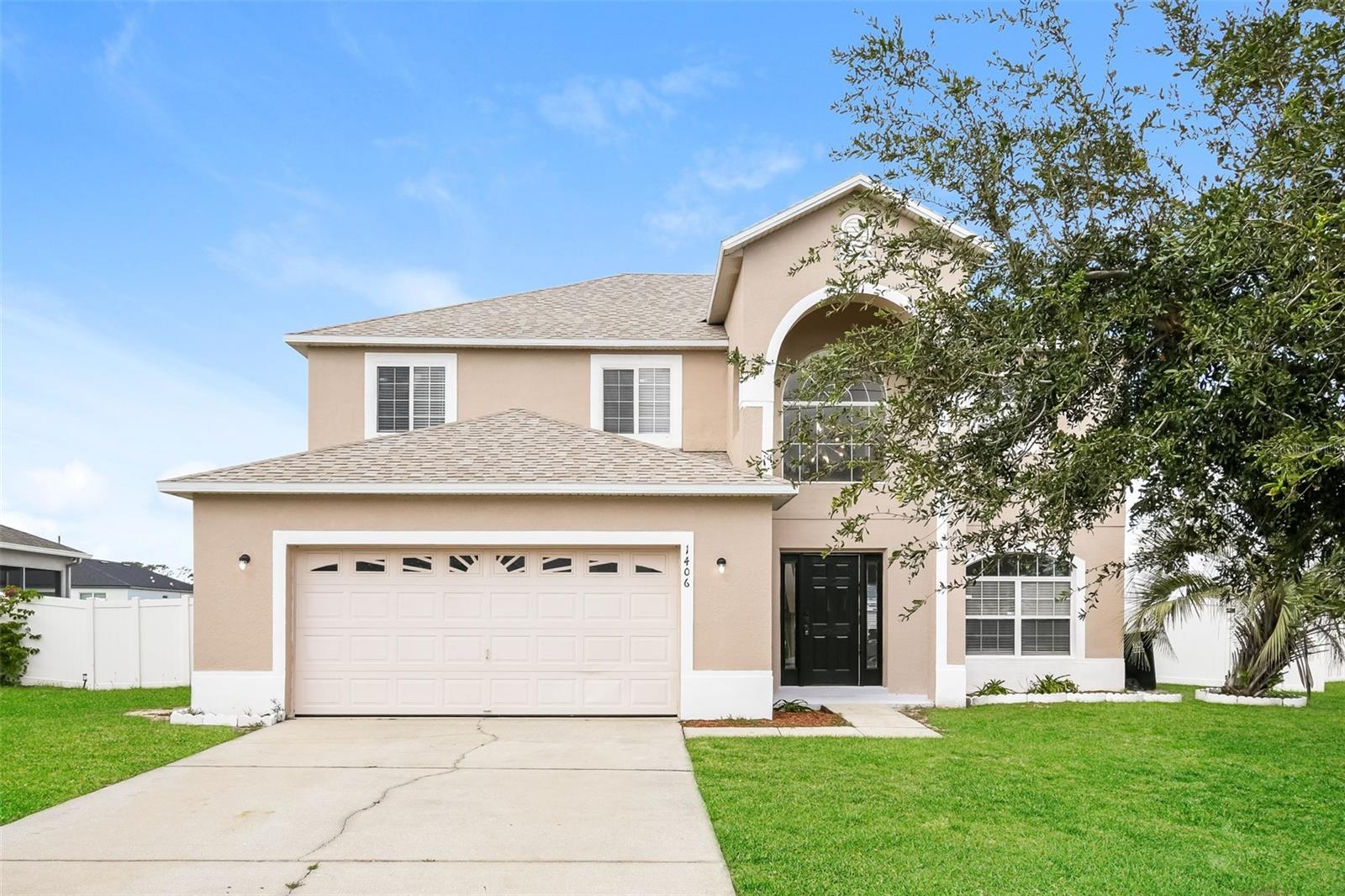 Charm and curb appeal abound for this Poinciana home! Step inside into the inviting foyer and into the well-appointed living room, positioned at the front of the home. Through the dining room you'll find the kitchen, which boasts stainless steel appliances, hard surface countertops, a pantry and a breakfast nook. A secondary living space and the laundry room round out the main floor. On the second floor you'll find the primary suite and three secondary bedrooms. Enjoy your private, enclosed backyard all year long! Come and see for yourself the possibilities that this home has to offer!