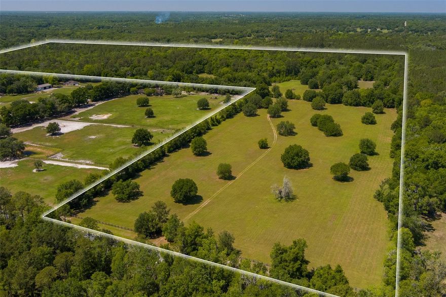 This 99+ acres is nestled just 14 minutes from the World Equestrian Center and 8 minutes from HITS! The property features open pastures scattered with majestic oak trees, offering the perfect blend of open space and natural shade. Tucked away in a more heavily wooded section of the property sits a two-story home with classic wood siding, featuring 3 bedrooms and 1.5 bathrooms. Whether you're envisioning a peaceful country retreat, an equestrian estate, or a unique investment opportunity near Ocala’s thriving equine scene, this property offers endless potential in a truly prime location!