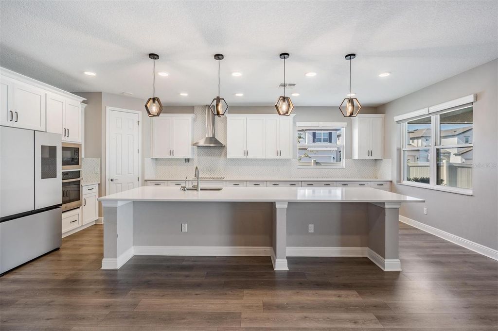 Photo of 33091 Sycamore Leaf Drive, Wesley Chapel, FL 33545 (MLS # TB8462068)