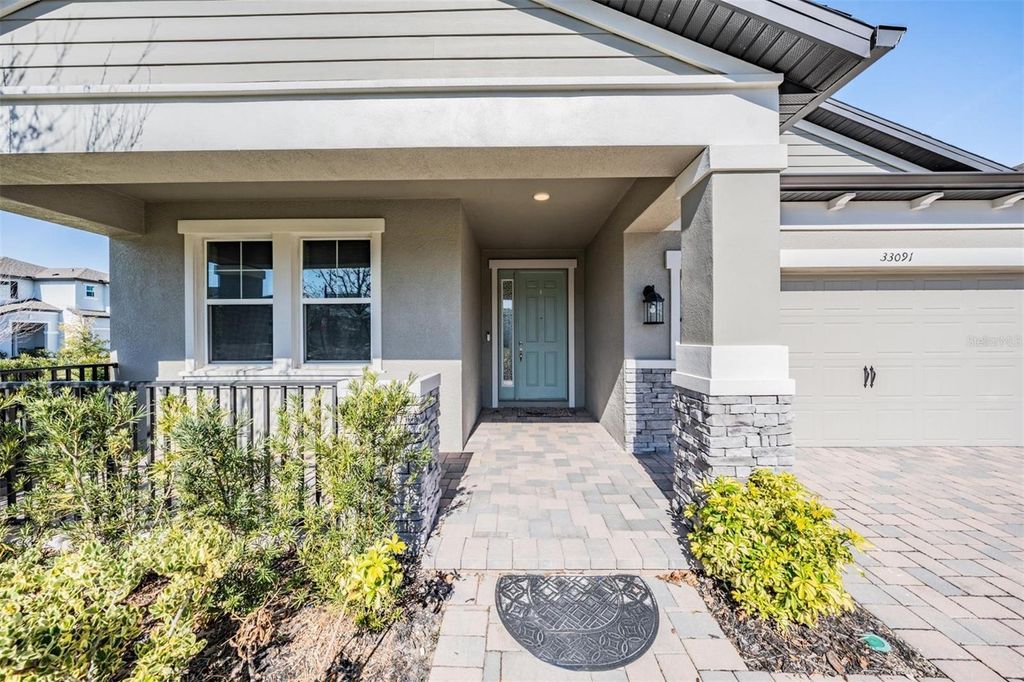 Photo of 33091 Sycamore Leaf Drive, Wesley Chapel, FL 33545 (MLS # TB8462068)