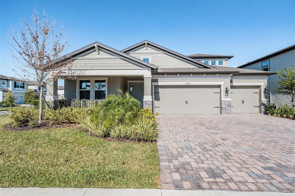 Photo of 33091 Sycamore Leaf Drive, Wesley Chapel, FL 33545 (MLS # TB8462068)