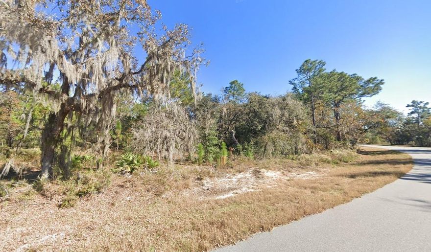 Discover the Perfect Opportunity to Build Your Florida Dream Home on this 1.46 acre Homesite! Nestled Among the Trees in the Established and Sought After Area of Wildwood Florida! This Oversized Property Offers an Abundance of Peace, Privacy, and Space! Oak Hill is Well Known for its Charm and Convenience. Minimal and Relaxed HOA. This Property Offers Plenty of Room for a Custom Designed Home, Stunning Pool Area and Even Outbuildings. If You can Imagine It, Make it a Reality on This Property! Conveniently Located Just Minutes from The Villages, Shopping Options and an Array of Dining Establishments to Enjoy. Golf Lovers This Spot is Perfect for You!! You’re also just a Quick Drive to I-75 and the Florida Turnpike, Giving You Easy Access to both Orlando and Tampa—Just About a Hour Away. Don’t Miss Your Chance, Secure this Gem Today! I'm Offering The Next Door For Sale as Well, Imagine Side by Side Development OR Double Lot for a Grand Homesite!!