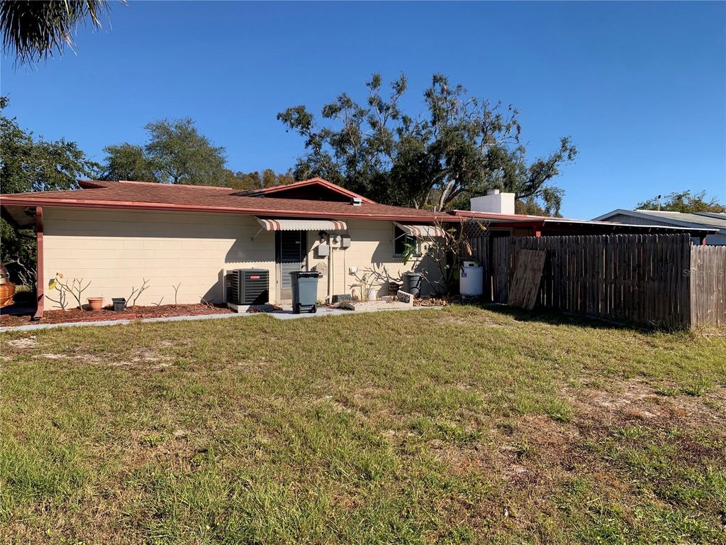 Photo of 11600 Crystal Lake Drive, Port Richey, FL 34668 (MLS # TB8379590)