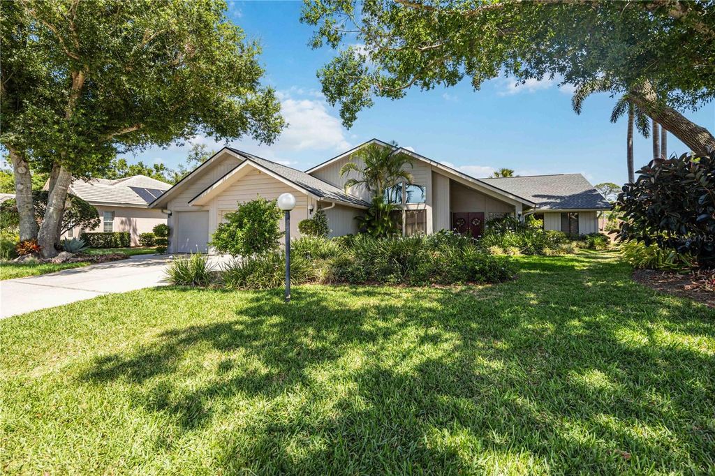 Photo of 8142 Misty Oaks Boulevard, Sarasota, FL 34243 (MLS # A4651022)