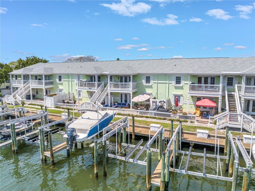 Boat slip is a 7,000 lb lift and comes with remote. Buyer must own property in Waterside to purchase slip. Slip is directly behind the unit owner has for sale at 5037 Starfish Drive, Unit A. It is being offered at $280,000 and is a 2 bedroom, 1 bathroom condo on the first floor.