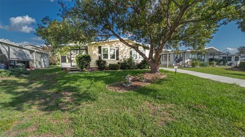Photo of 1725 Hilton Head Boulevard, Lady Lake, FL 32159 (MLS # O6321543)