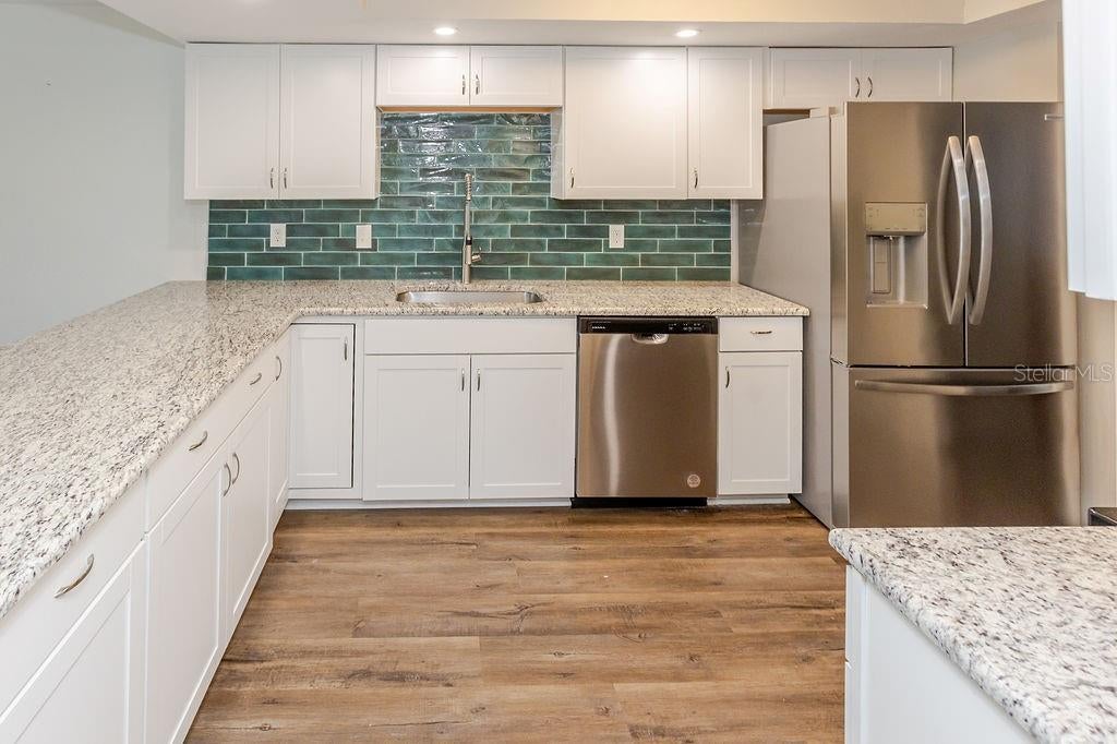 Photo of 7623 Radcliffe Circle #111A, Port Richey, FL 34668 (MLS # W7889021)