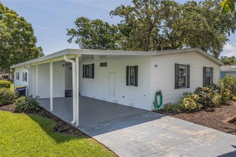 Photo of 209 Schooner Avenue, Edgewater, FL 32141 (MLS # NS1085003)