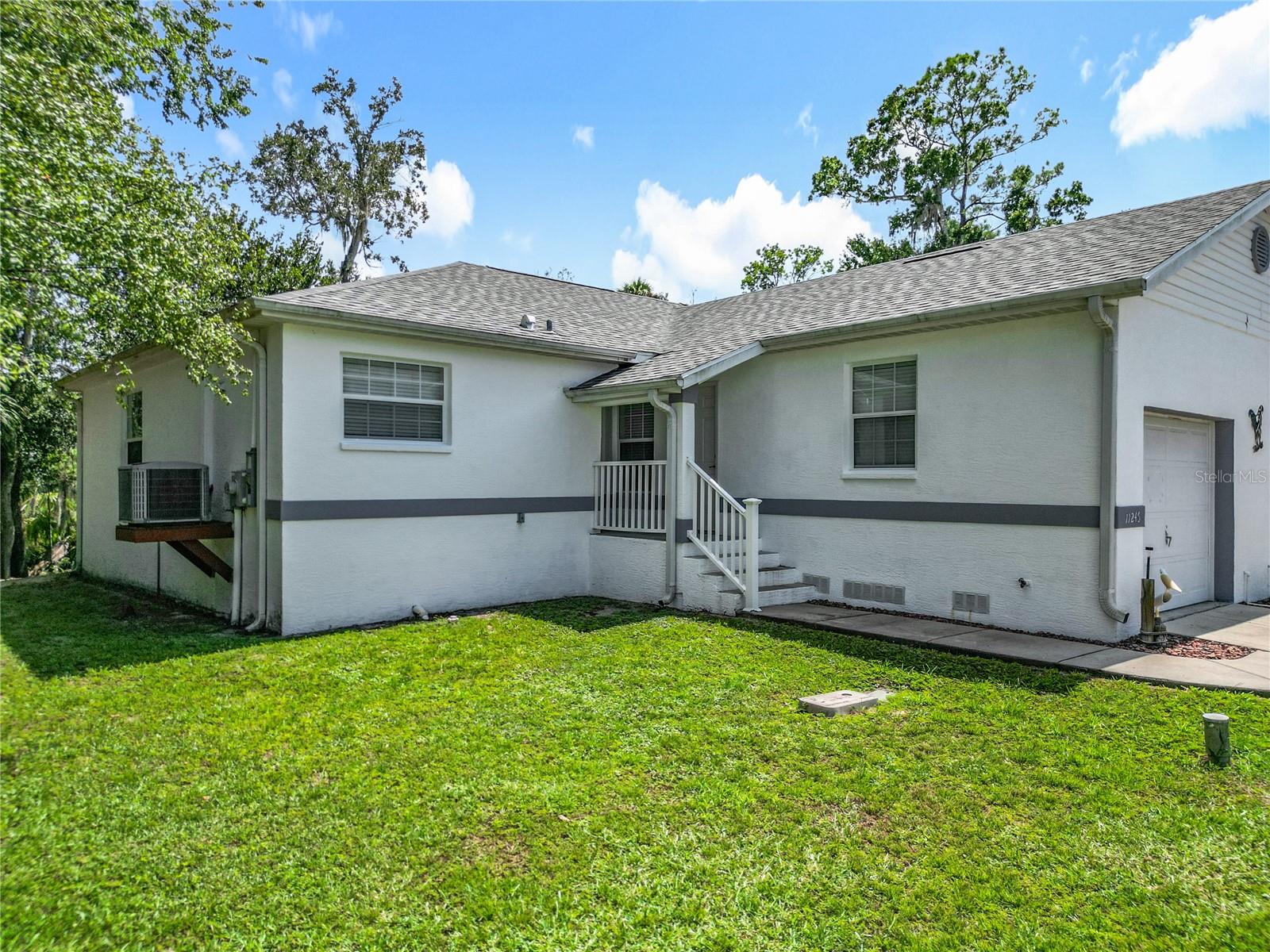 Move-In Ready & Fully Furnished! Welcome to your new slice of Florida living! This charming 2-bedroom villa is one of only six tucked away on a quiet cul-de-sac with no thru traffic—perfect for peace and privacy. Step inside and you’ll love the bright, open floor plan with soaring cathedral ceilings that connect the kitchen, dining, and living areas. From here, take in the serene views of the screen porch and lush natural landscape. Picture yourself sipping morning coffee in the sunshine or grilling out on the attached deck—it’s all about easy living here! The primary suite offers comfort and convenience with its own private bath featuring a relaxing jetted tub and plenty of storage. A second bedroom and guest bath are nearby, making visitors feel right at home. You’ll also appreciate the 20x14 garage (hello, storage!) plus an assigned parking space outside. Recent updates include a brand-new roof in 2024, so you can move in worry-free. Ideally located just off HWY 19 in Crystal River, you’re minutes from shopping, dining, downtown festivals, boat ramps, and all the water fun the Nature Coast is famous for! Whether you’re looking for a full-time residence or a snowbird getaway, this villa checks all the boxes for carefree Florida living.