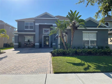 Photo of 5870 Cheshire Cove Terrace, Orlando, FL 32829 (MLS # O6396389)