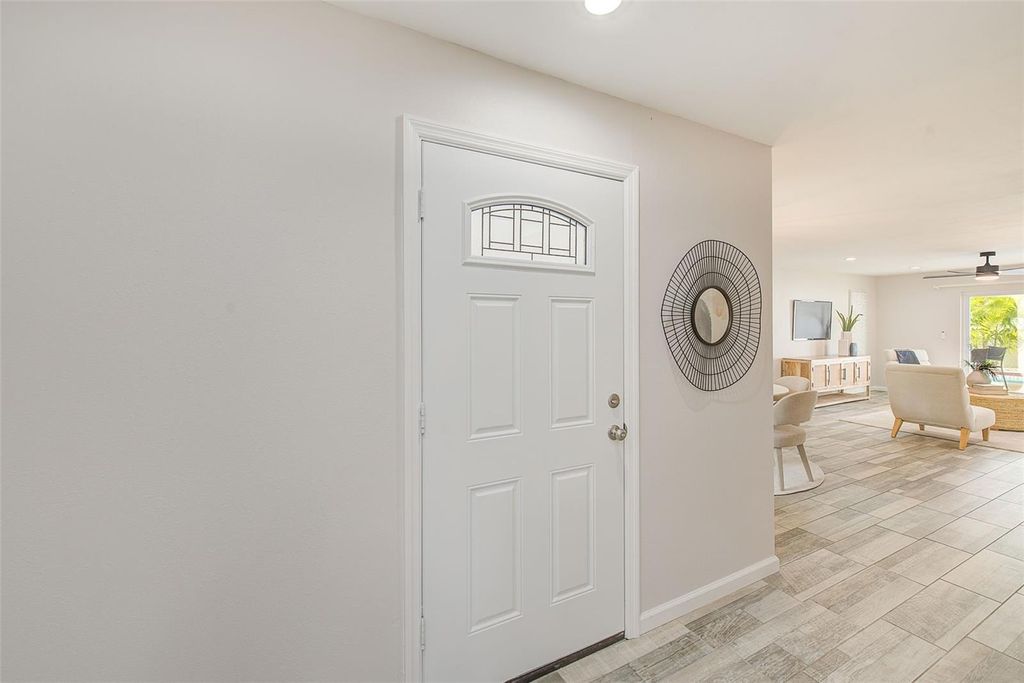 Photo of 2589 Sunny Breeze Avenue, Largo, FL 33770 (MLS # TB8464112)