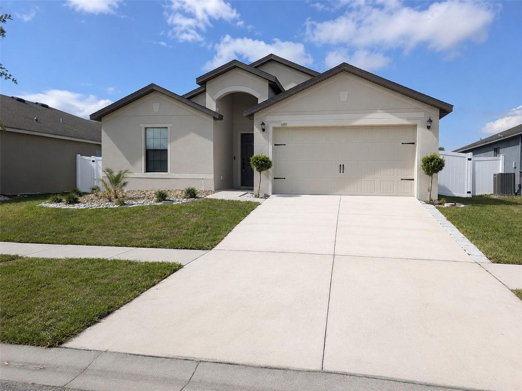 Photo of 680 Swallowtail Drive, Haines City, FL 33844 (MLS # TB8498348)